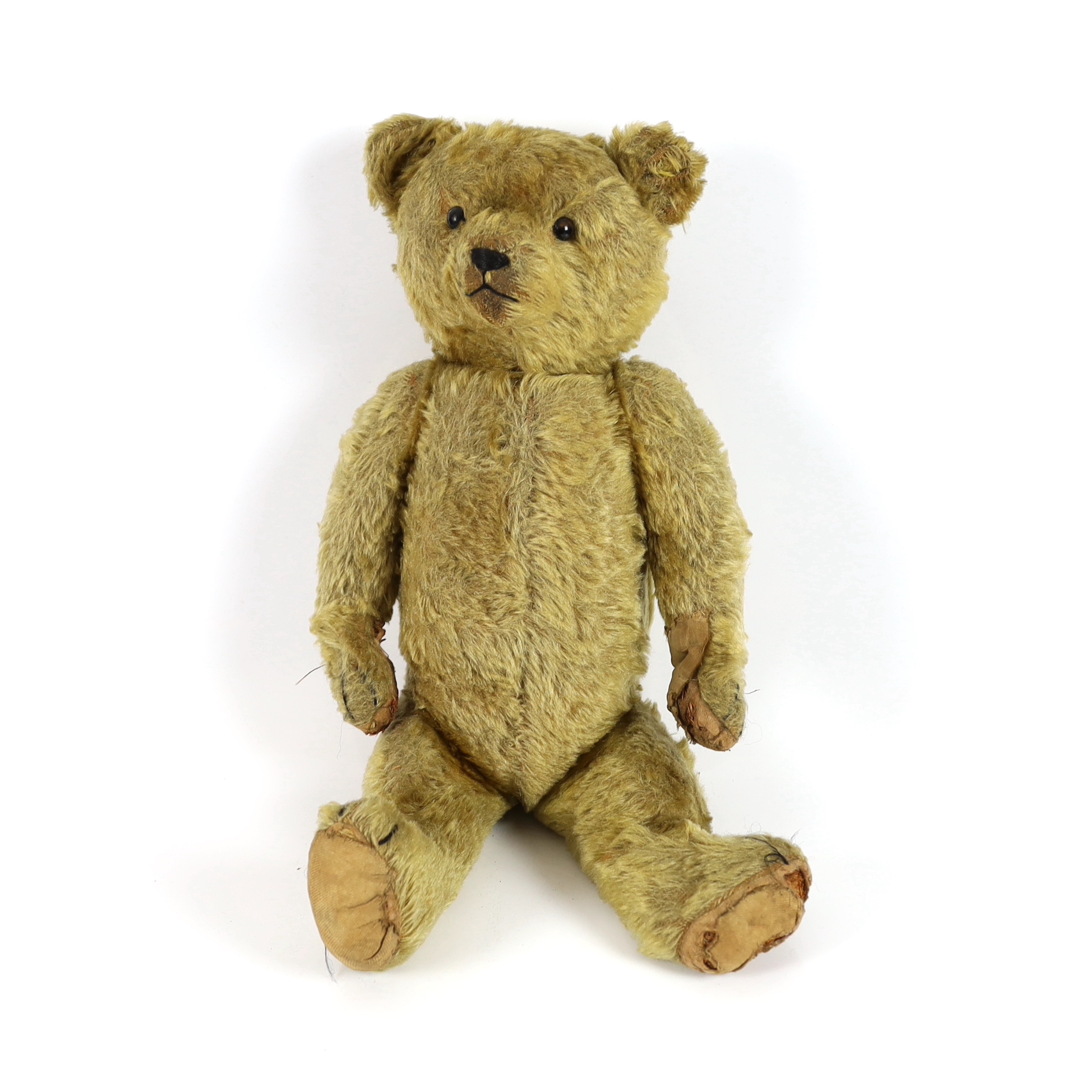 An early German bear, c.1912, black button eyes, 45cm, old repair to paws, good mohair